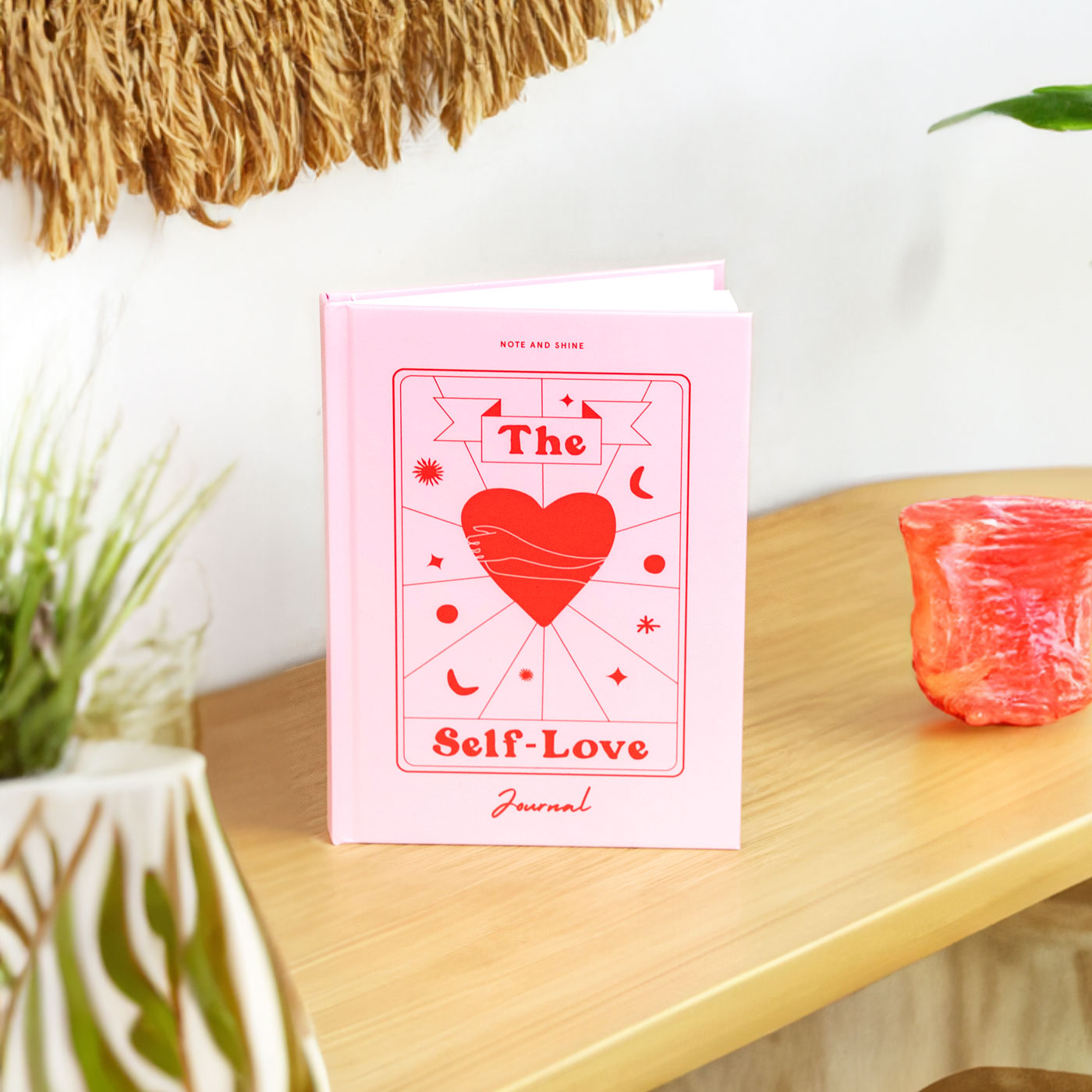 'The Self-Love Journal' in a home office